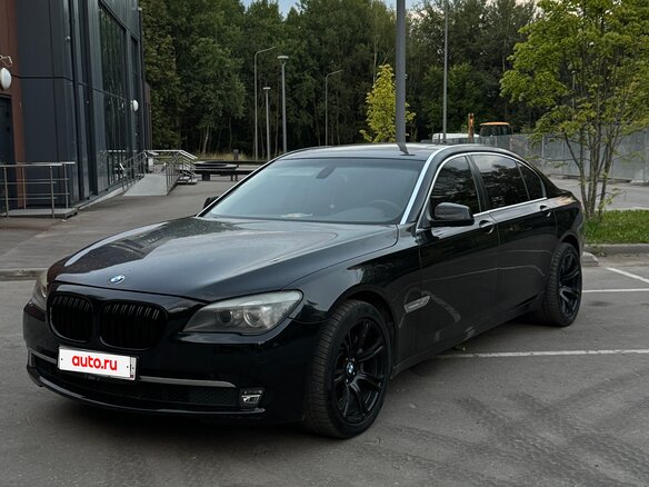 2011 BMW 7 серии 750i xDrive V (F01/F02/F04), чёрный - вид 1