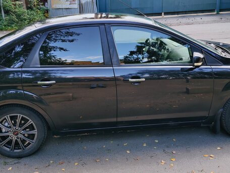 2010 Ford Focus II Рестайлинг, чёрный, 610000 рублей, вид 3