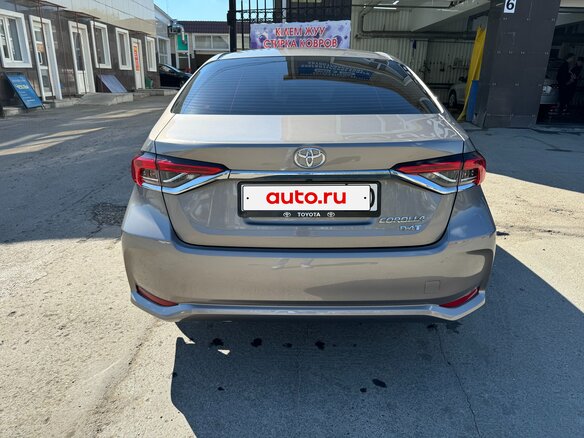 2022 Toyota Corolla XII (E210), коричневый, 1790000 рублей - вид 5