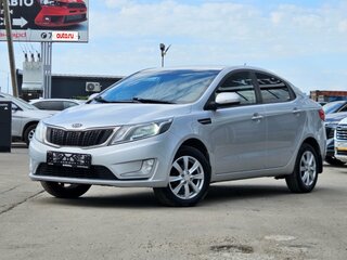 2012 Kia Rio 4-speed III, серебристый, 720000 рублей, вид 1