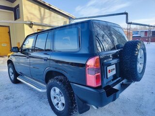 2011 Nissan Patrol V (Y61) Рестайлинг, чёрный, 3500000 рублей, вид 4