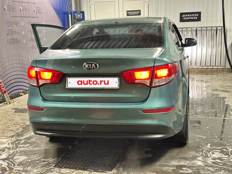 2011 Kia Rio 4-speed III, зелёный, 600000 рублей, вид 2