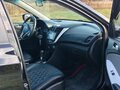 2014 Hyundai Solaris I, чёрный, 730000 рублей - вид 4