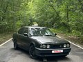 1990 BMW 5 серии 525i III (E34), чёрный - вид 1