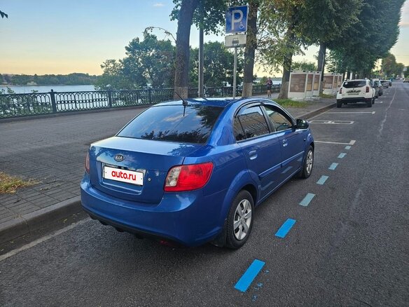 2010 Kia Rio II Рестайлинг, синий - вид 2