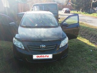 2008 Toyota Corolla X (E140, E150), чёрный, 680000 рублей, вид 1