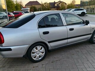 2003 Mitsubishi Carisma I Рестайлинг, серебристый, 299900 рублей, вид 5