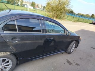 2010 Mitsubishi Lancer X, чёрный, 570000 рублей, вид 3