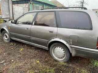 1990 Nissan Primera I (P10), коричневый, 90000 рублей, вид 1