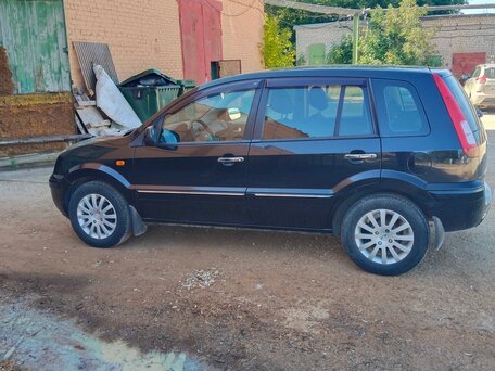 2011 Ford Fusion I Рестайлинг, чёрный, вид 4
