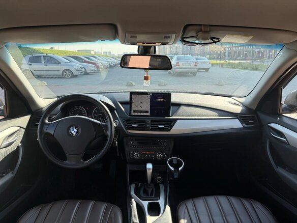 2013 BMW X1 18i I (E84) Рестайлинг, коричневый, 1350000 рублей - вид 11