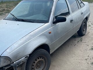 2010 Daewoo Nexia I Рестайлинг, серебристый, 70000 рублей, вид 2