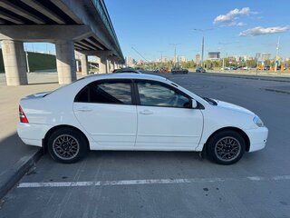 2002 Toyota Corolla IX (E120, E130), белый, 500000 рублей, вид 2