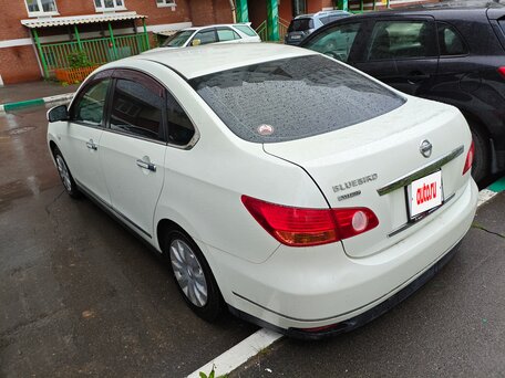 2009 Nissan Bluebird Sylphy II (G11), белый, 730000 рублей, вид 4
