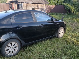 2012 Kia Rio 5-speed III, чёрный, 430000 рублей, вид 5