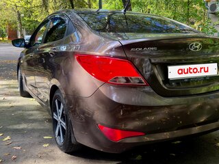 2016 Hyundai Solaris I Рестайлинг, коричневый, 880000 рублей, вид 5