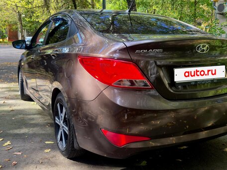 2016 Hyundai Solaris I Рестайлинг, коричневый, 880000 рублей, вид 5