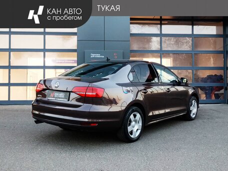 2015 Volkswagen Jetta VI Рестайлинг, коричневый, 928393 рублей, вид 3