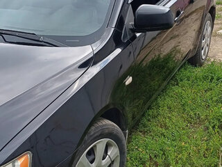 2013 Mitsubishi Lancer X Рестайлинг, чёрный, 560000 рублей, вид 4