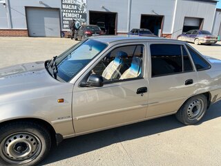 2013 Daewoo Nexia I Рестайлинг, золотистый, 260000 рублей, вид 4