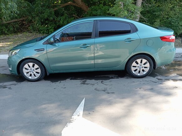 2013 Kia Rio 4-speed III, зелёный, 668000 рублей - вид 5