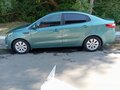 2013 Kia Rio 4-speed III, зелёный, 668000 рублей - вид 5