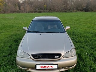 2001 Kia Clarus II, бежевый, 300000 рублей, вид 3