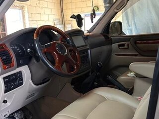 2004 Toyota Land Cruiser 105 100 Series Рестайлинг 1, золотистый, 4000000 рублей, вид 4