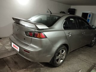 2012 Mitsubishi Lancer X Рестайлинг, серебристый, 650000 рублей, вид 2