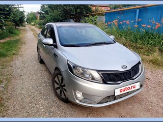 2012 Kia Rio 4-speed III, серебристый, 830000 рублей, вид 1