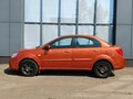 2010 Kia Rio II Рестайлинг, оранжевый - вид 4