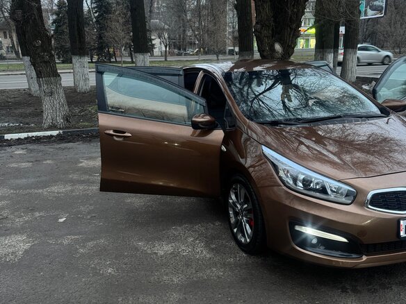 2015 Kia Ceed II Рестайлинг, коричневый, 920000 рублей - вид 6