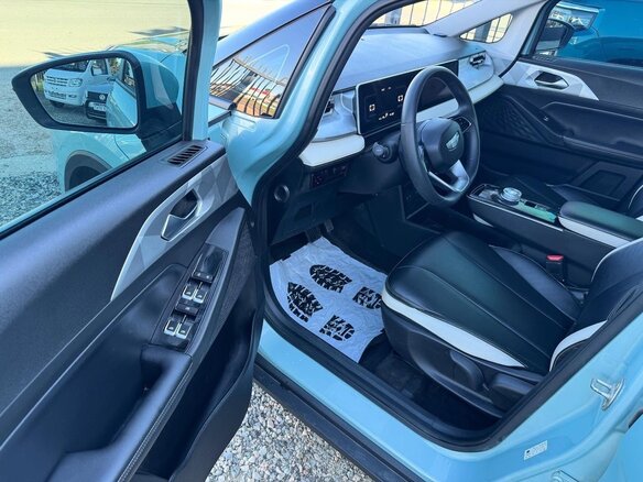 2025 Geely Geometry E 33.5 kWh, голубой, 1520000 рублей - вид 7
