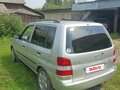 2001 Mazda Demio I (DW), серебристый, 260000 рублей - вид 2