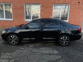 2015 Volkswagen Jetta VI Рестайлинг, чёрный, 700000 рублей, вид 4