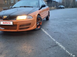 2003 Mitsubishi Carisma I Рестайлинг, оранжевый, 210000 рублей, вид 1