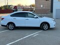 2014 Nissan Almera III (G15), белый - вид 2