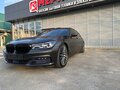2016 BMW 7 серии 750i xDrive VI (G11/G12), коричневый, 5200000 рублей - вид 1