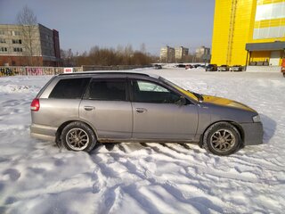 2001 Nissan Wingroad II (Y11), серебристый, 600000 рублей, вид 3