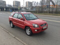 2009 Kia Sportage II Рестайлинг, красный - вид 1