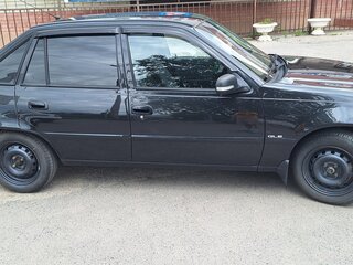 2012 Daewoo Nexia I Рестайлинг, чёрный, 350000 рублей, вид 4