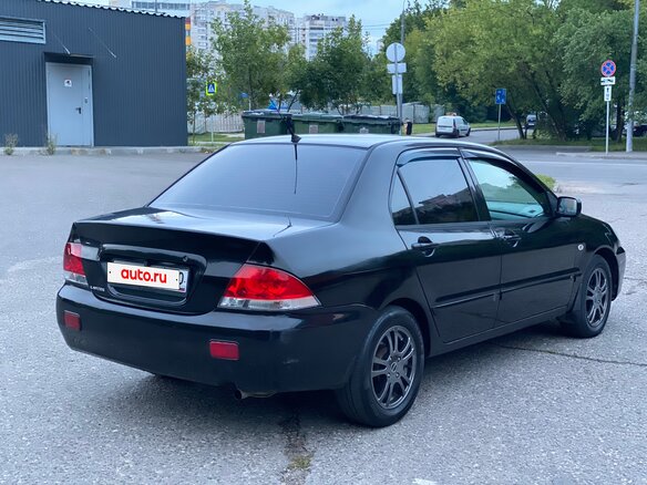 2005 Mitsubishi Lancer IX, чёрный - вид 38