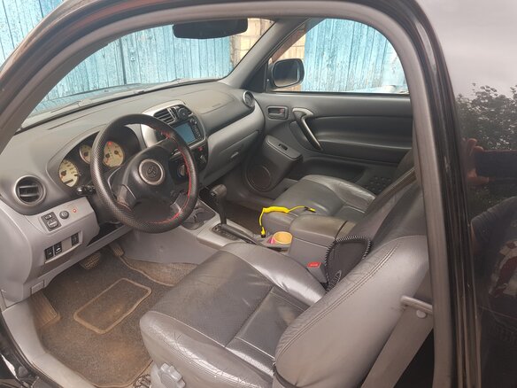 2003 Toyota RAV4 II (XA20), чёрный - вид 3