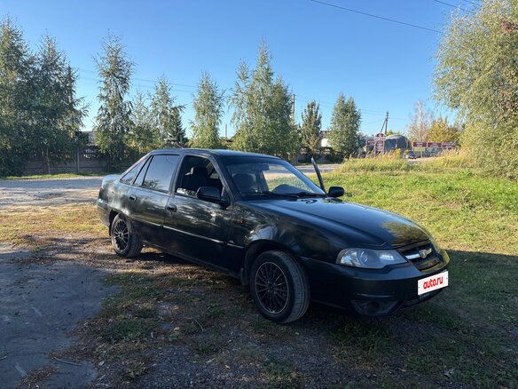 2012 Daewoo Nexia I Рестайлинг, чёрный, 180000 рублей - вид 1