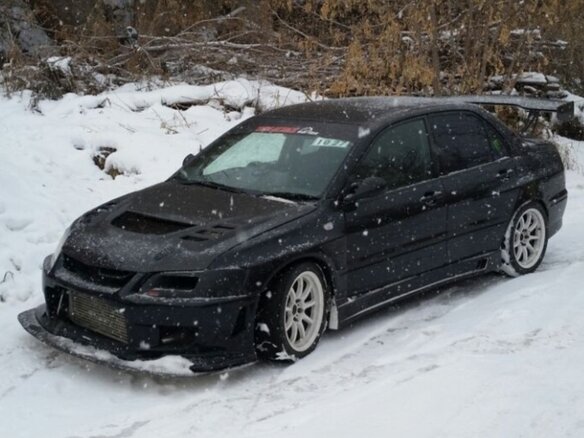 2002 Mitsubishi Lancer Evolution VII, чёрный, 1600000 рублей