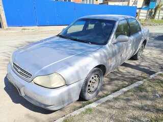 1999 Kia Clarus II, серебристый, 220000 рублей, вид 1