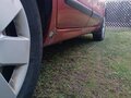 2007 Nissan Note I, красный, 395000 рублей - вид 9
