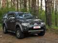 2011 Mitsubishi L200 IV, серый, 1990000 рублей - вид 4