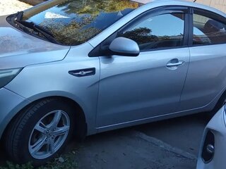 2014 Kia Rio 4-speed III, серебристый, 500000 рублей, вид 4