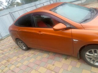 2015 Hyundai Solaris I Рестайлинг, оранжевый, 650000 рублей, вид 3